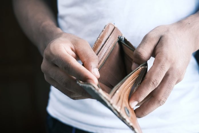 man hand open an empty wallet